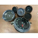 A CAV ammeter, two others, a Veglia fuel water and oil gauge, a 0-90mph speedometer and a Kienzle