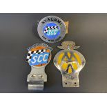 Three South African badges including The Sports Car Club of South Africa.