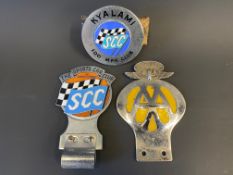 Three South African badges including The Sports Car Club of South Africa.