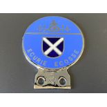 An original 1960s Ecurie Ecosse chrome and enamel car badge, in good condition.