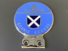 An original 1960s Ecurie Ecosse chrome and enamel car badge, in good condition.
