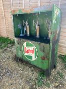 A Castrol garage forecourt oil cabinet, with a circular advertising sign to the front.