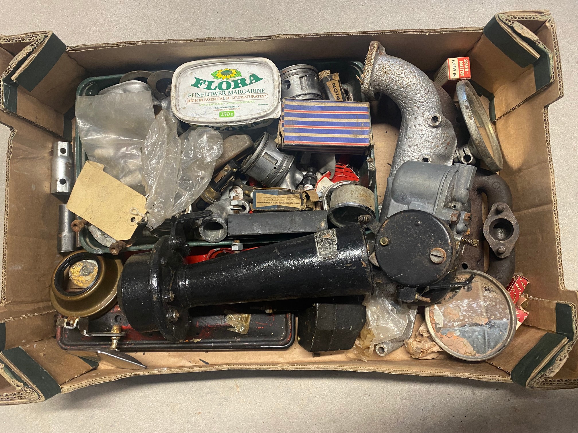 A box of Austin 7 parts.