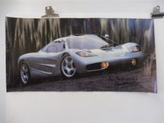 A poster of a McLaren signed and dedicated by Jonathan Palmer.