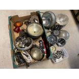 A box of mixed lamps and gauges.