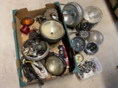 A box of mixed lamps and gauges.