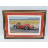 A framed and glazed limited edition print by Graham Turner of Mike Hawthorn in a Ferrari Dino 246