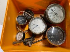 A Smiths 0-60mph speedometer, two Smiths clocks and various other gauges.