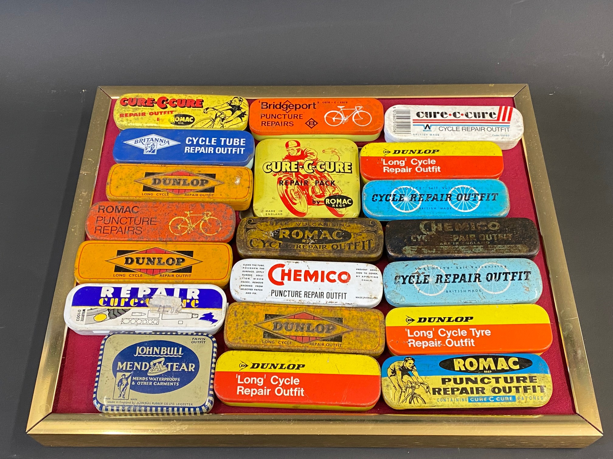 A selection of puncture repair outfit tins.