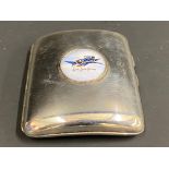 A very good quality silver plated cigarette case with an inset porcelain enamel disc advertising