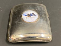 A very good quality silver plated cigarette case with an inset porcelain enamel disc advertising