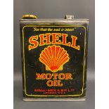 A Shell Motor Oil rectangular gallon can, of bright colour.