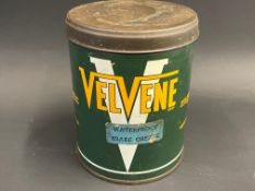 A Velvene grease tin.