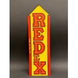 A Redex directional arrow card, 15 1/2 x 4 3/4".