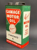 A Gamage Motor Oil gallon can.