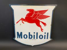 A small Mobiloil enamel sign with flying pegasus motif, dated April 1953, 12 x 12".