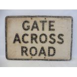 An aluminium road sign for 'Gate Across Road' with integral glass reflectors, 21 1/4 x 14 1/4".
