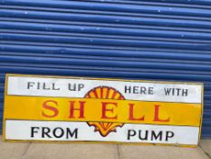A Shell 'Fill up here from the pump' enamel sign, heavily restored.
