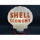 A Shell Economy glass petrol pump globe by Hailware, in good condition, fully stamped underneath.