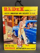 A small Redex Refresher pictorial tin advertising sign depicting a female garage attendant filling