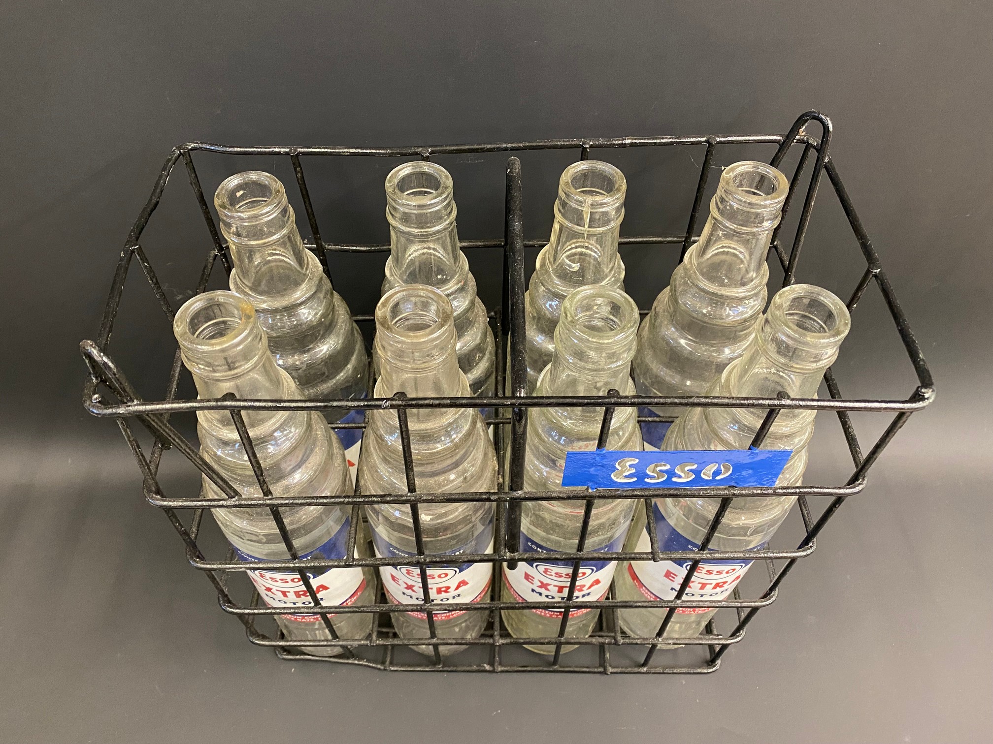 A set of eight Esso Extra Motor Oil glass quart oil bottles, with good labels, in a carrying crate. - Image 2 of 4