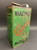 A Wakefield Castrol Motor Oil CW grade gallon can.