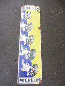 A Michelin pictorial enamel sign, depicting five images of Mr Bibendum rolling tyres, 15 1/2 x 59".