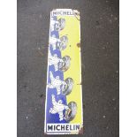 A Michelin pictorial enamel sign, depicting five images of Mr Bibendum rolling tyres, 15 1/2 x 59".