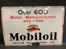 A Gargoyle Mobiloil enamel sign bearing the words 'Over 600 Motor Manufacturers say-use...', 45 x