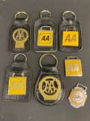 A group of AA keyrings, plus a National Super keyring.