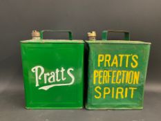 Two Pratts two gallon petrol cans, with correct Pratts brass caps.