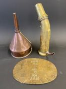 A brass petrol filler, a small copper funnel and a Ruston Hornsby oval brass information plate.