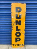 A Dunlop Tyres rectangular enamel sign, 18 x 61".