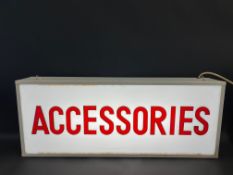 A garage showroom illuminated lightbox for 'Accessories', 36" w x 14" h x 6" d.