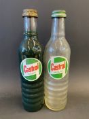 Two Castrol Motor Oil quart oil bottles, one full.