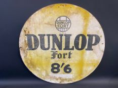 A Dunlop Fort circular cardboard advertising sign, 26" diameter.