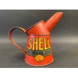 A Shell Motor Oil pint measure in good condition.