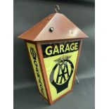 An AA Garage illuminated hanging lightbox, of tapering form, 23" w x 29" h (excluding hanging