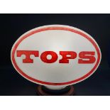 A Tops oval plastic petrol pump globe.