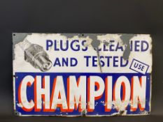 A Champion spark plugs part pictorial rectangular enamel sign with spark plug image, 21 x 12 1/2".