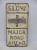 A 'Slow Major Road Ahead' aluminium road sign, with integral glass reflective discs, 14 x 27 1/2".