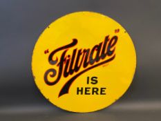 A Filtrate is here circular double sided enamel sign in superb near mint condition, 24" diameter.
