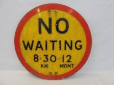 A No Waiting circular road sign, 20" diameter.