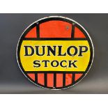 A Dunlop Stock circular double sided enamel sign, 24" diameter.