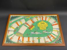 A framed and glazed Pratts High Test Brooklands Race Game board, 26 x 16 1/2", sold with counters in