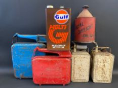 Two Eversure fuel cans, two Valor paraffin cans, a Gulf gallon can and a Royal Daylight Oil can.