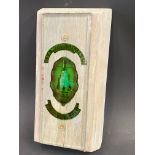 A B.S.A Motor Cycles Ltd bevel edged glass finger/door plate, mounted on timber for display, 3 x