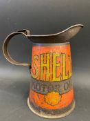 An early Shell Motor Oil quart measure, tall version.