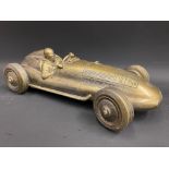 A contemporary decorative model of a circa 1950s Mercedes grand prix car.