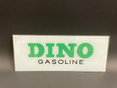 A DINO gasoline glass petrol pump brand insert in good condition, 12 1/4 x 5".